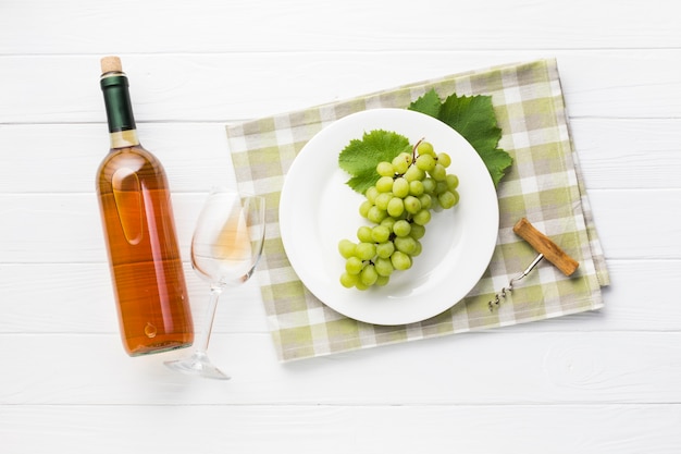 Top view white wine on wooden table