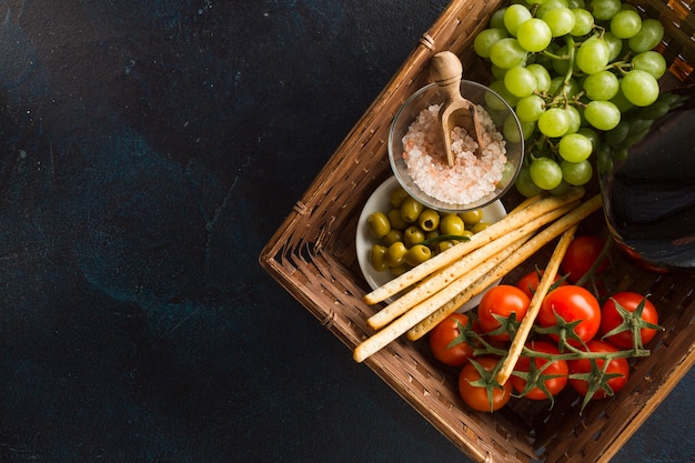 Top view of wicker basket with healthy products