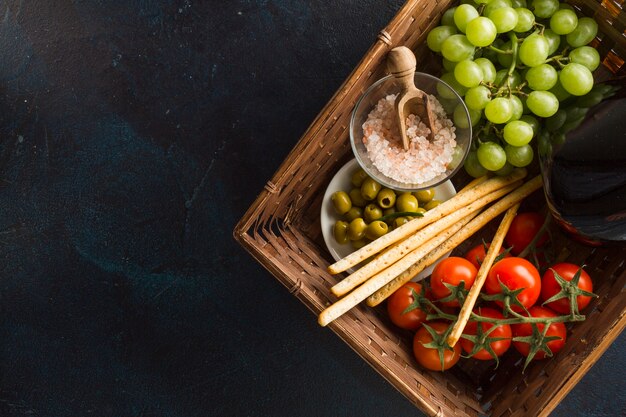 Top view of wicker basket with healthy products