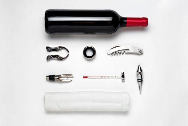 Top view wine bottle and utensils