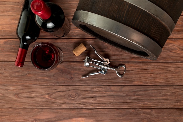 Top view wine bottles on wooden background