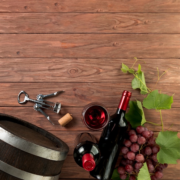 Top view wine bottles on wooden background