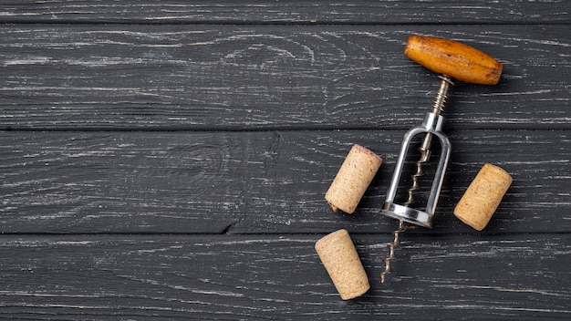 Top view wine stoppers and corkscrew