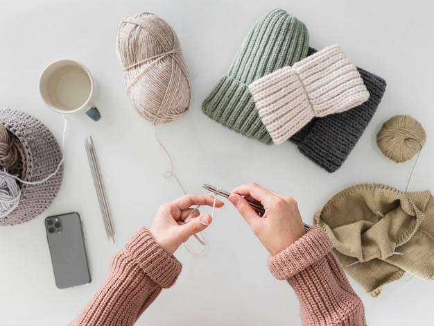 Top view woman knitting