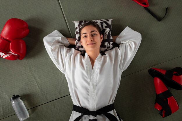 Top view woman laying on floor