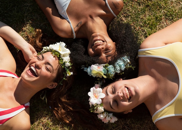 Top view woman laying on grass