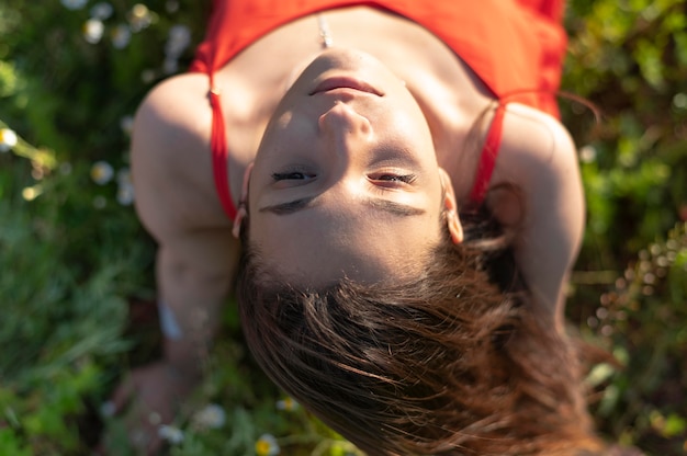 Free photo top view woman posing in nature