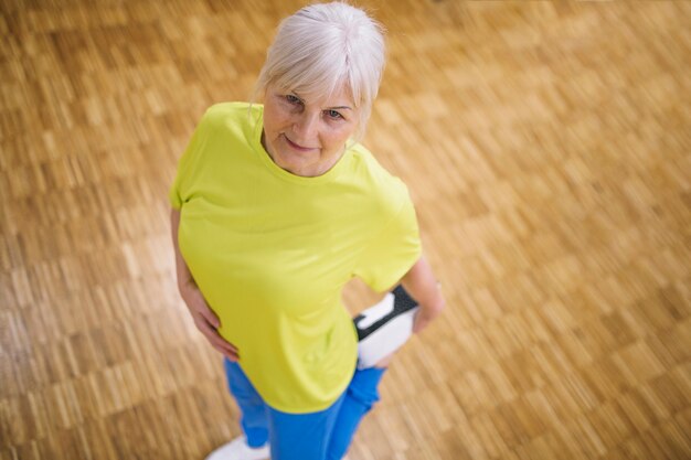 Top view of woman stretching