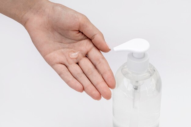 Top view woman using liquid soap