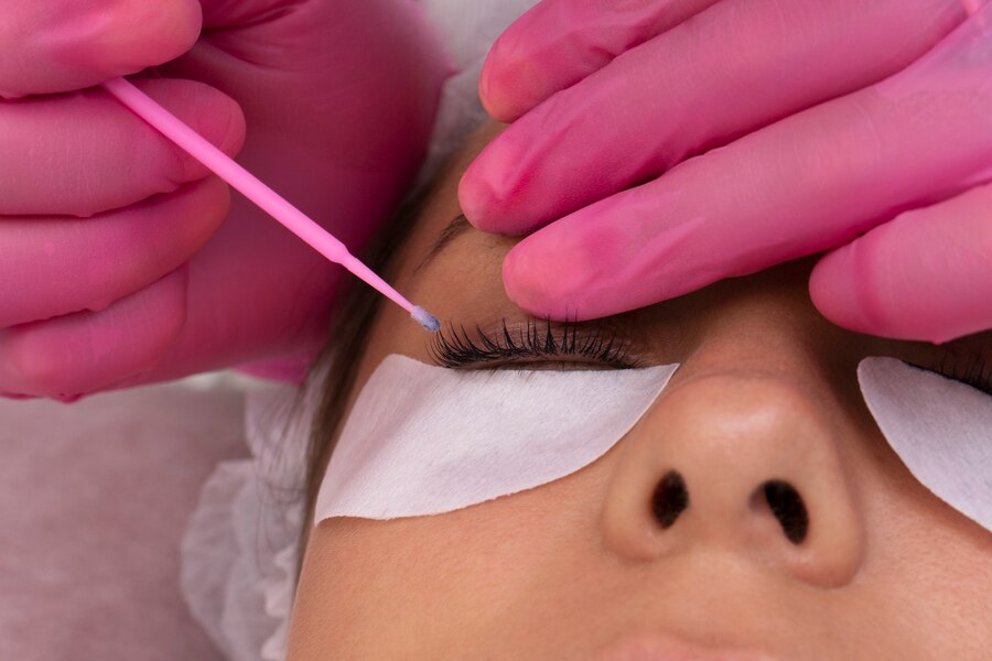 top view woman wearing eye patches