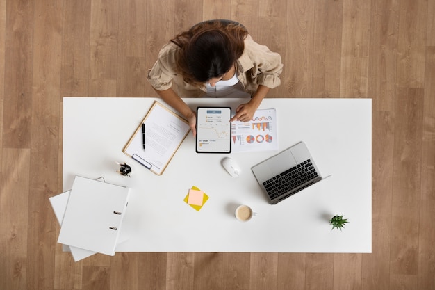 Top view woman working at desk