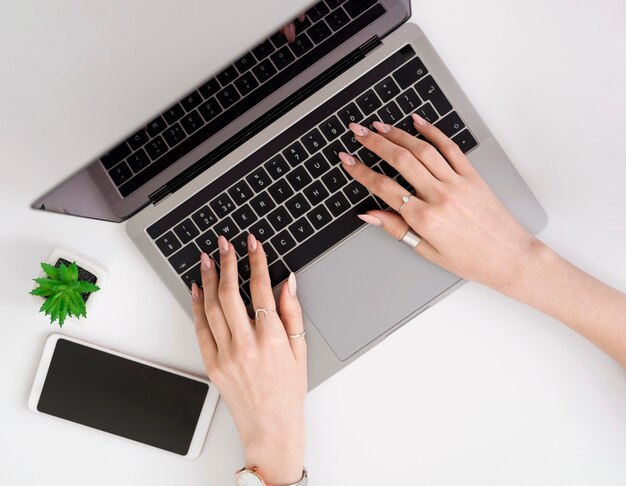 Top view woman working on laptop