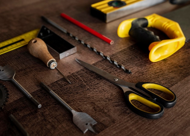 Free photo top view wood tools on desk