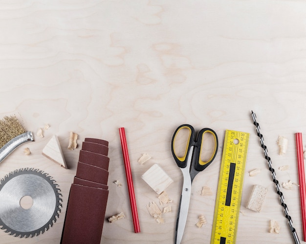 Free photo top view wood tools on desk