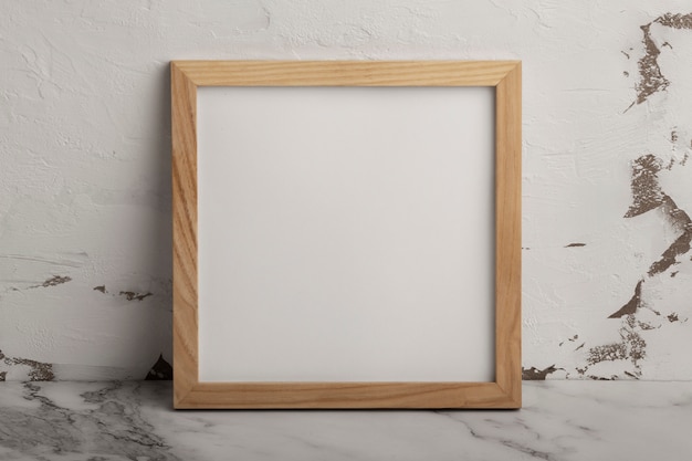 Free photo top view wooden empty frame