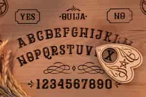 Free photo top view wooden ouija board