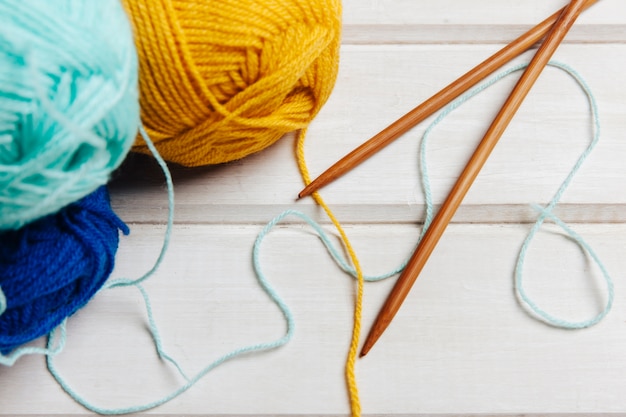 Top view of wool and needles