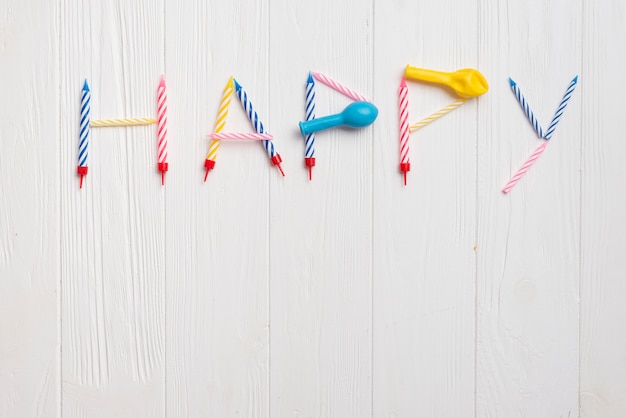 Top view word made by balloons and candles