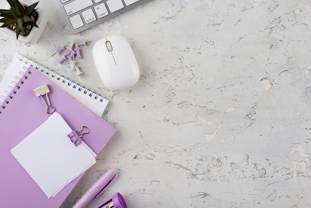 Top view workplace elements on marble table