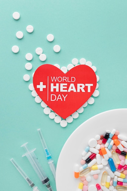Top view world heart day concept with medicine