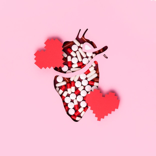 Free photo top view world heart day with pills