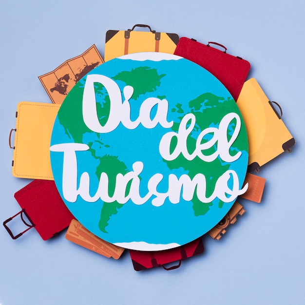 Top view world tourism day with lettering