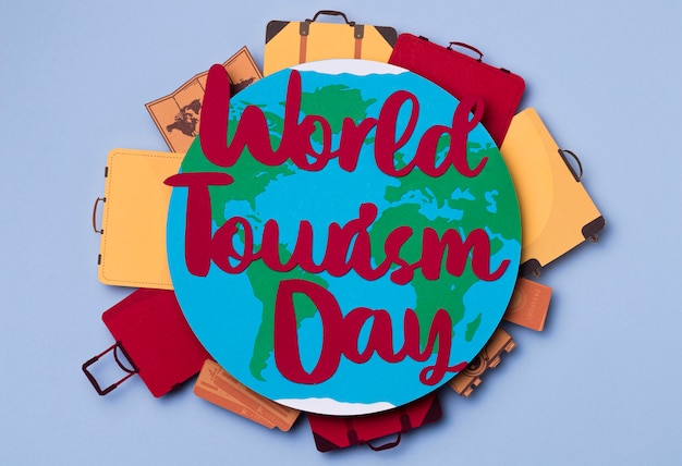 Top view world tourism day with lettering