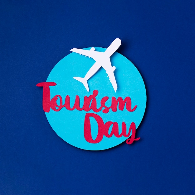 Free photo top view world tourism day with lettering