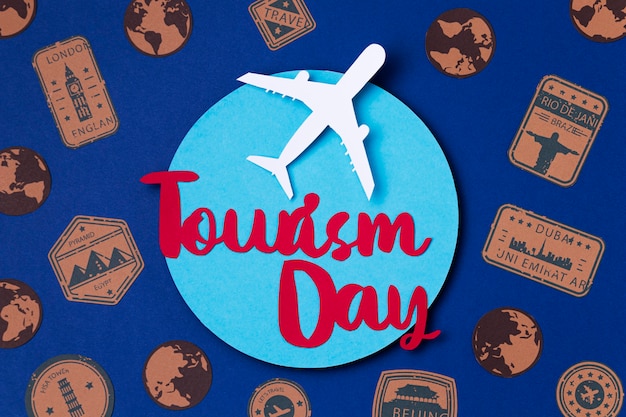 Top view world tourism day with lettering