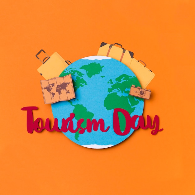 Free photo top view world tourism day with lettering