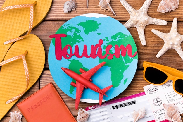 Free photo top view world tourism day with lettering