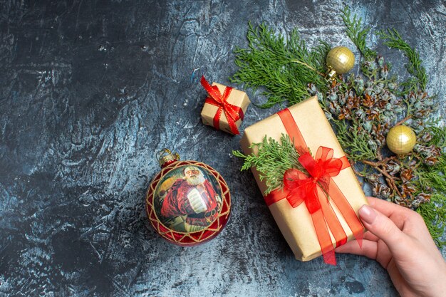 Top view xmas presents on light-dark background