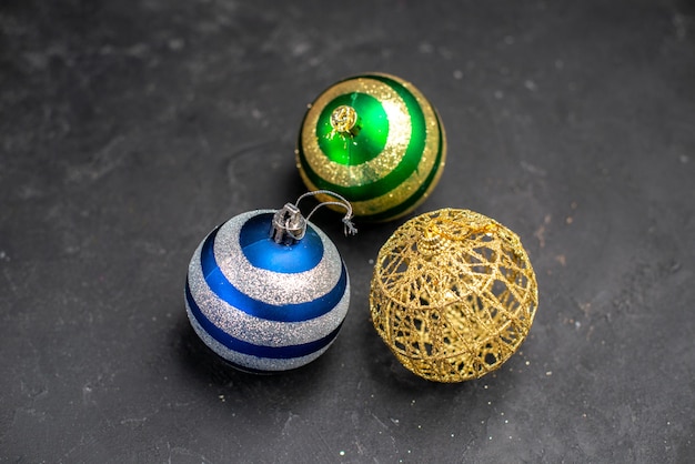 Top view xmas tree balls on dark isolated surface free space