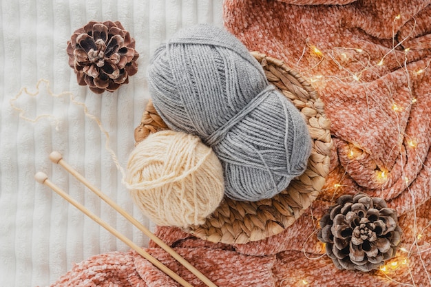 Top view yarn in basket with lights on blanket