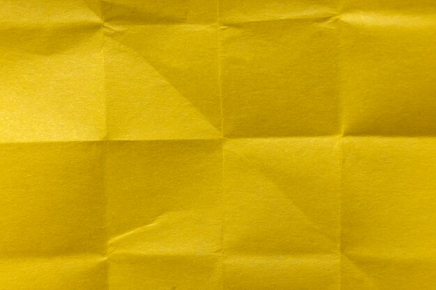 Вид сверху желтая мятая бумага