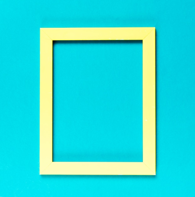 Free photo top view yellow decorative frame