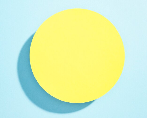 Top view yellow plate on table