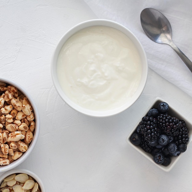 Top view yogurt bowl and fruits