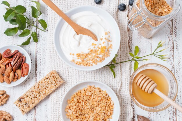 Top view yogurt bowl with oats on the table