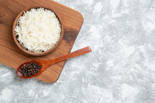 Free photo top view yummy cooked rice inside plate on white