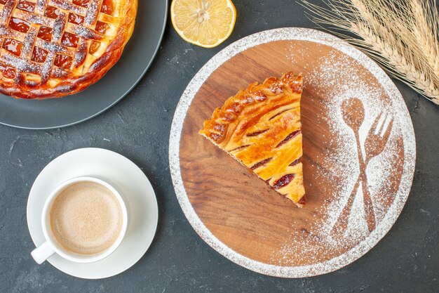 Top view yummy fruit pie with jam on gray tea cake dough dessert biscuit sugar pie sweet bake