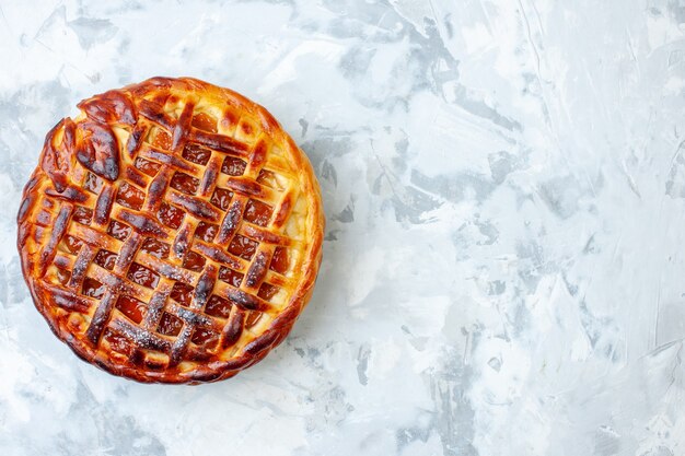 Top view yummy fruity pie with jelly on light biscuit cookie bake nut pie cake dessert color tea