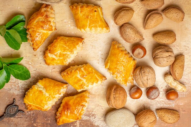 Top view of yummy nut pastries sweet cakes