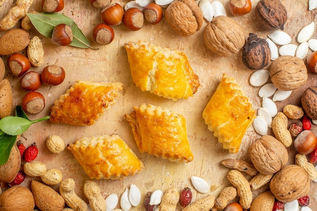 Top view of yummy nut pastries sweet cakes