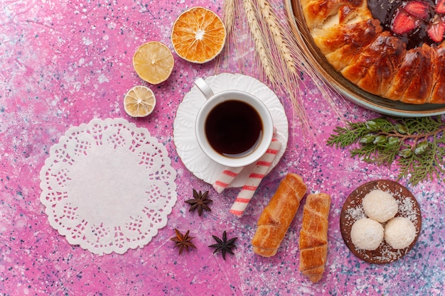 Top view yummy strawberry pie fruity cake with jelly and fruits on pink