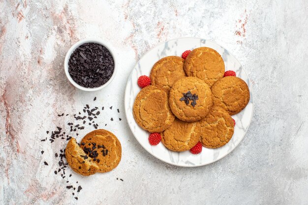 Top view of yummy sugar cookies on white surface