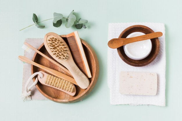 Top view zero waste arrangement on green background