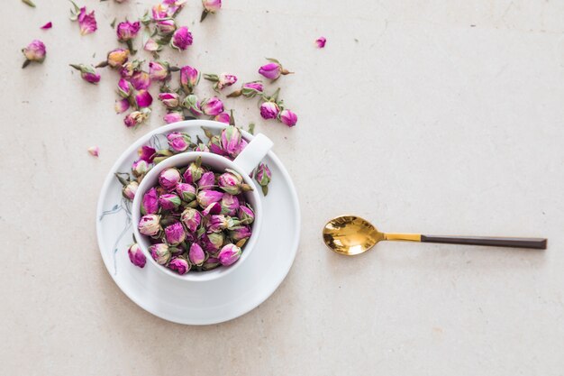 Top viewcup of tea full of flowers