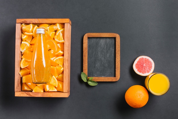 Topview orange juice with chalkboard