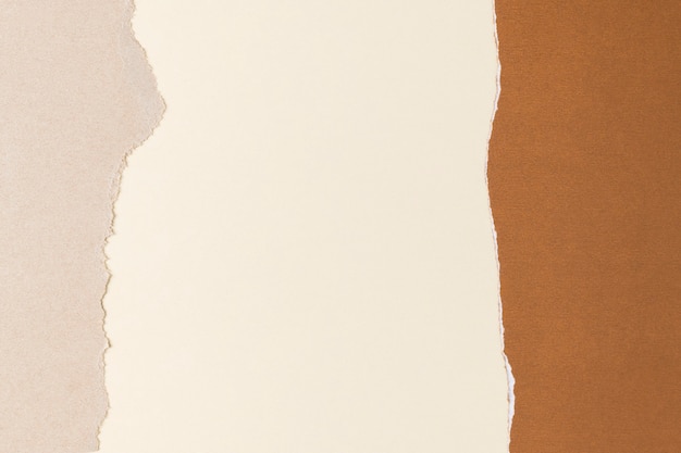 찢어진 베이지 색 종이 공예 프레임 수제 지구 톤 배경